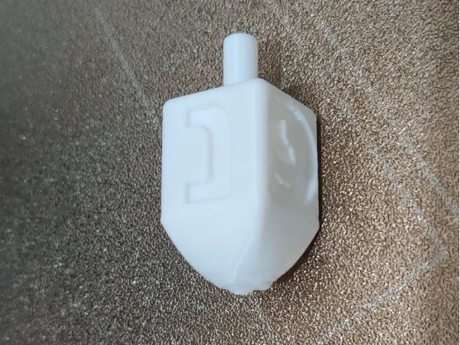 Hanukkah spinning top