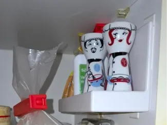 Shelf in wall cabinet