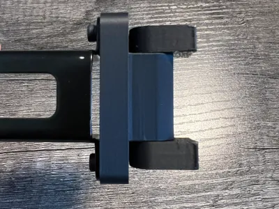 Modified folding spool holder bracket