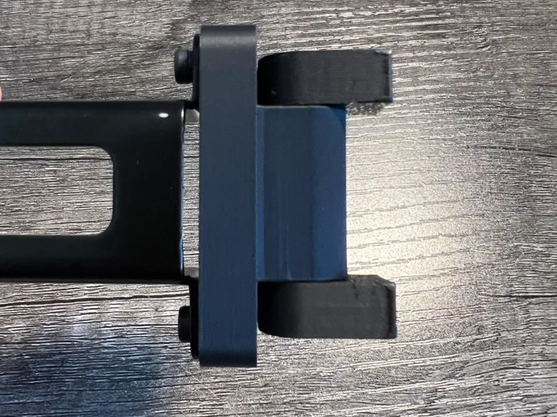 Modified folding spool holder bracket