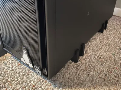 PC tower legs. Elevated for airflow.
