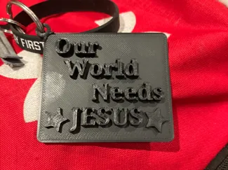 Our world needs Jesus keychain