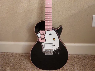 Hello Kitty headstock, binding, letters, pickguard