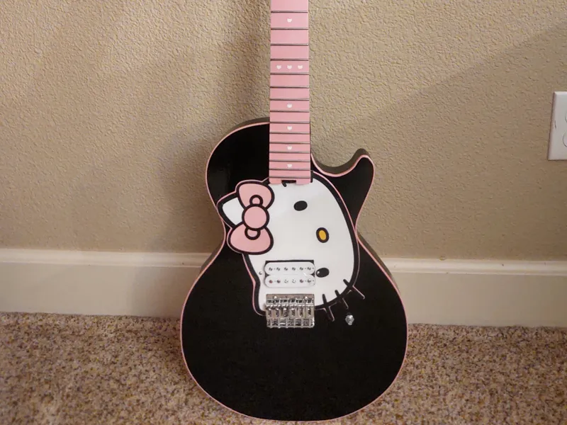 Hello Kitty headstock, binding, letters, pickguard