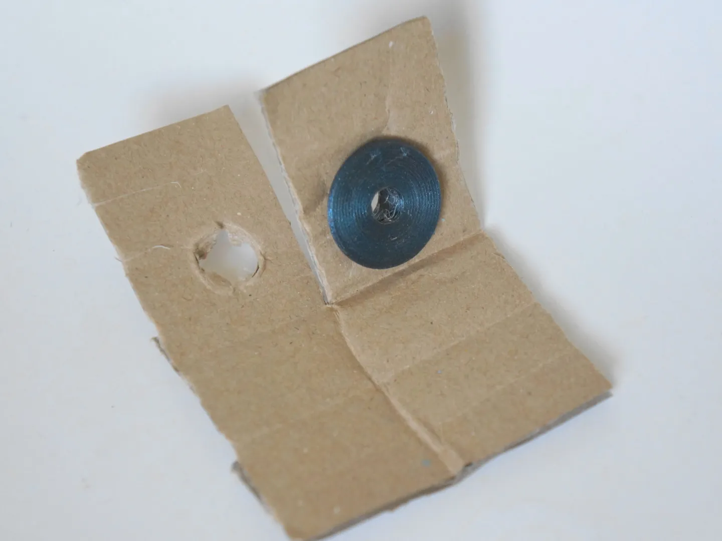 cardboard square with slot