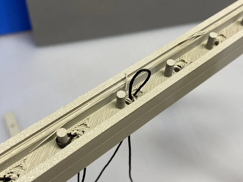 A close-up of a piece of metal
Description automatically generated