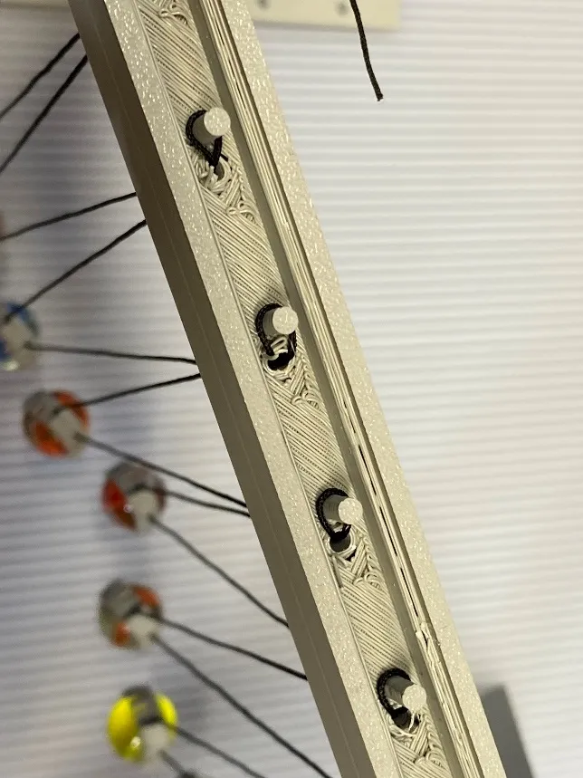 A close-up of a model of a bridge
Description automatically generated