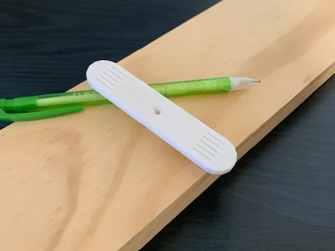 Center finder with finger grooves