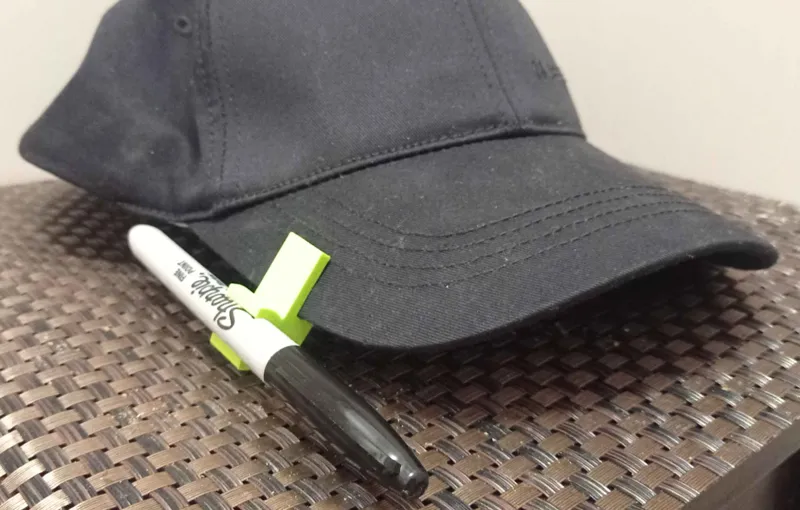 Baseball cap pen clip