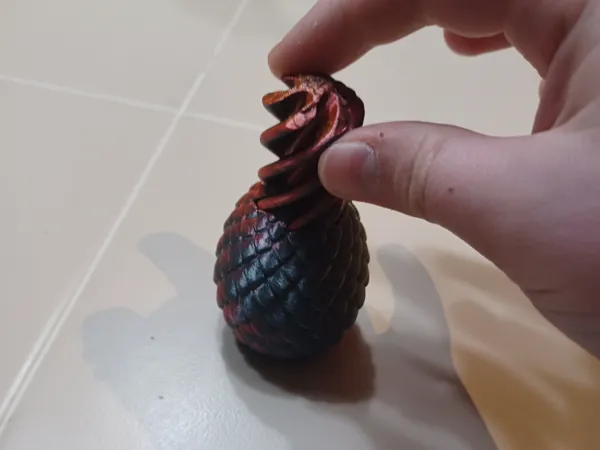 Œuf de dragon fidget en spirale