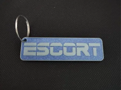 Bicolor Ford Escort keychain.