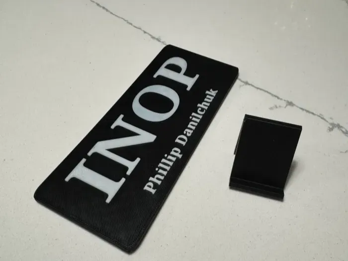 INOP desk plate 