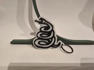 Metallica snake logo keychain