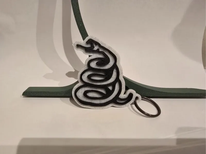 Metallica snake logo keychain