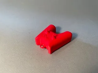 controller back pack charm