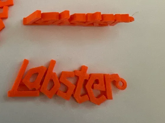 Keychain for Labster film lab in Bratislava.