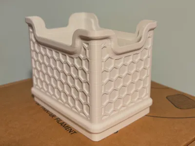 Stackable storage with hexagonal pattern on sides