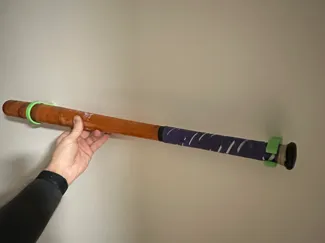 Baseball bat rack