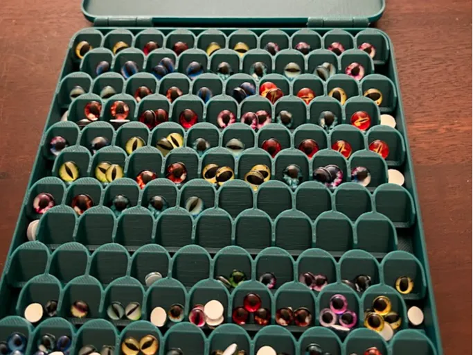 Box for storing stick-on eyes