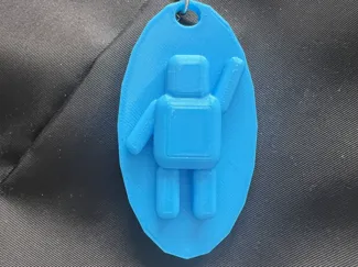 block human keychain