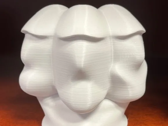 Three Faces Sculpture