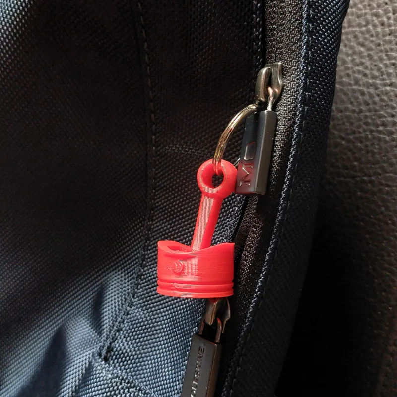 Print-in-place piston and rod fidget keychain