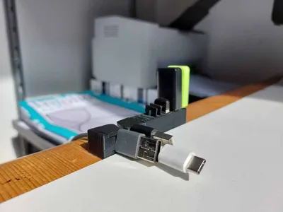 Multimaterial desk organizer (USB, microSD, cable)