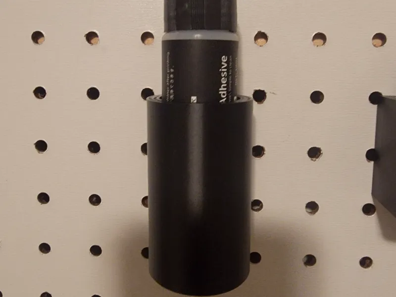 Peg board adhesive glue holder