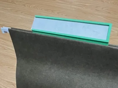 Hanging folder label holder