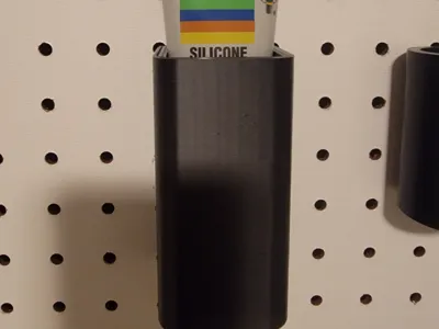 Peg board lubricant holder
