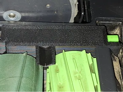 Roomba brush latch