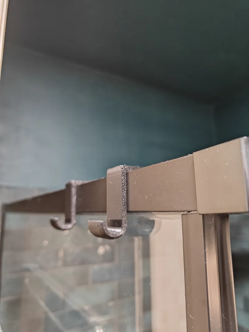 Simple modern towel hook for shower cabin