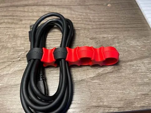 A black and red cable

AI-generated content may be incorrect.