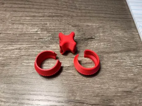 Red objects on a wood surface

AI-generated content may be incorrect.