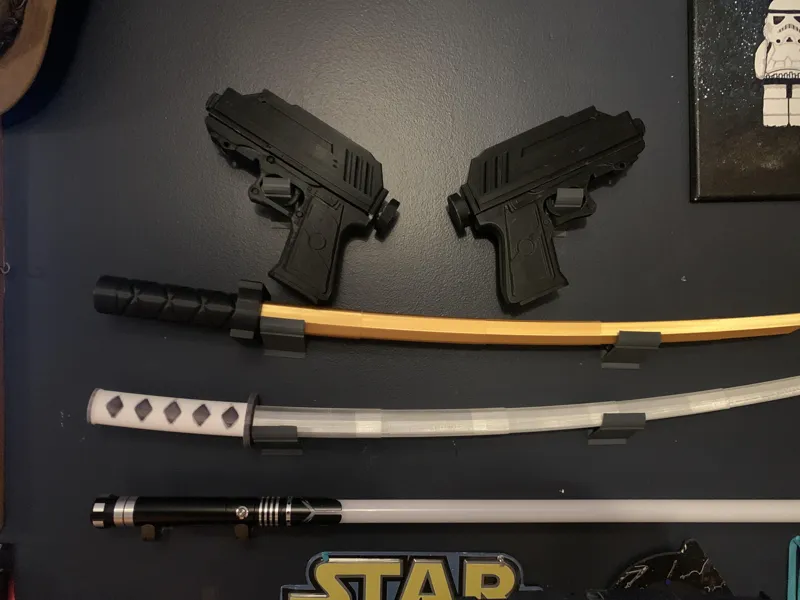 Wall mount hanger for 3-D printed swords