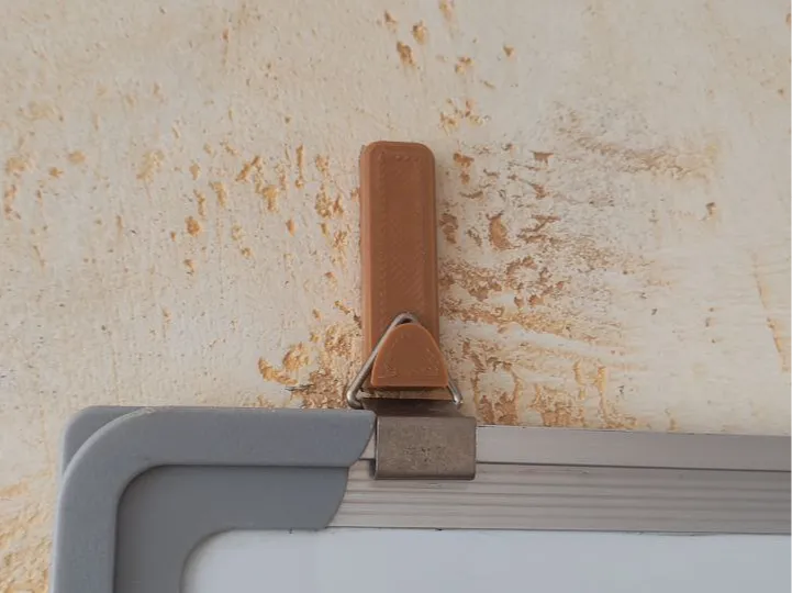 Adhesive wall hook for whiteboard