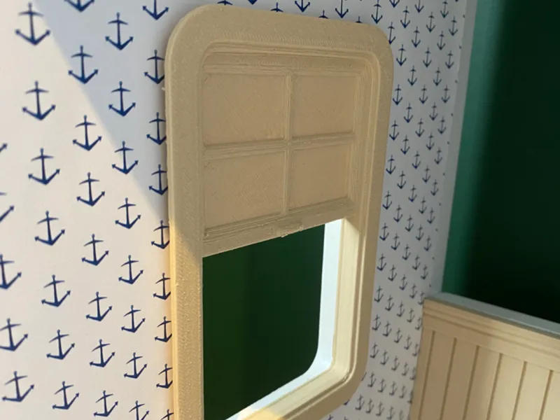 Miniature window frame with rounded corners