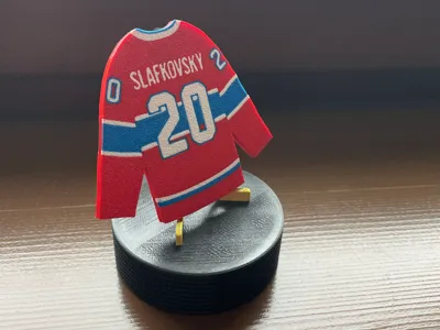 Miniature J.Slafkovsky Hockey Jersey on Puck Stand