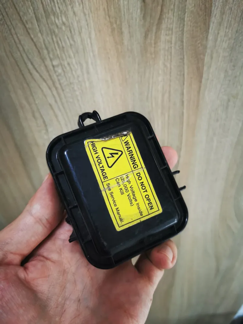 Headlight housing cap