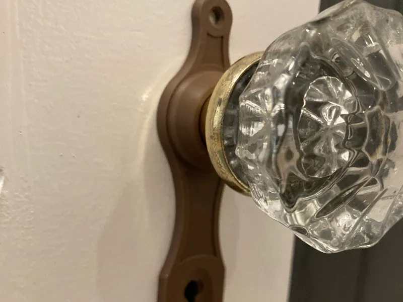 antique door knob plate