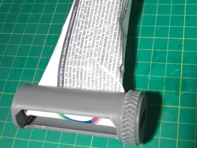Toothpaste squeezer with easy release after used.