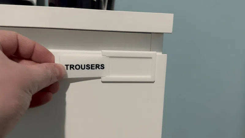 Sliding the label into the mount