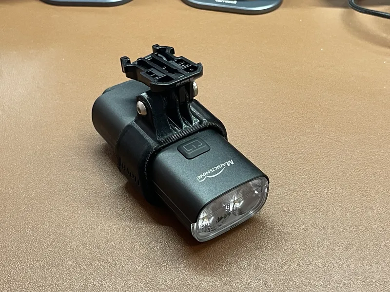 Magicshine RN3000 front light under computer mount