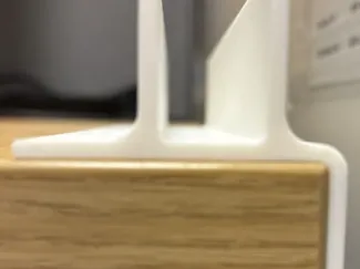 Vertical laptop stand for desk