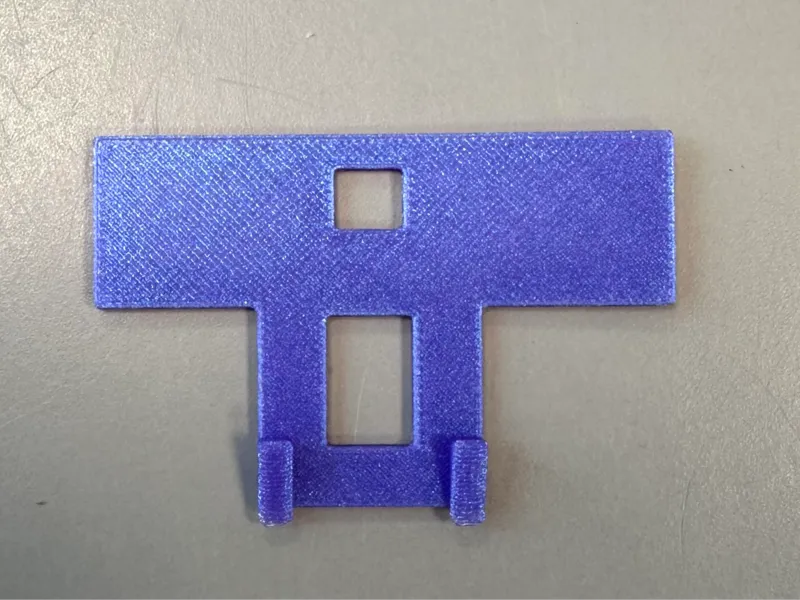 Clip for paper dispenser