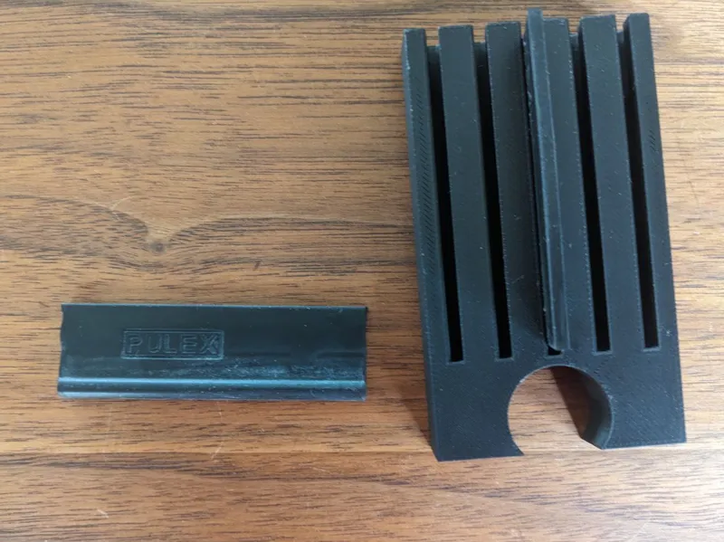 Wiper mounts adjusted for rubber squeegee