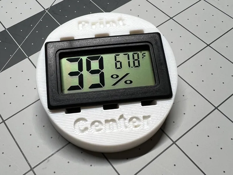 Cereal box lid vented hygrometer holder