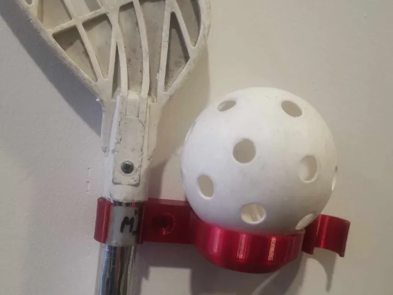 Floor hockey stick holder