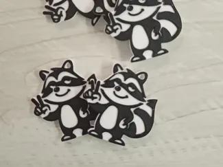 Greeting raccoon keychain