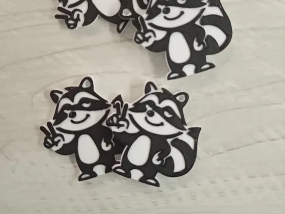 Greeting raccoon keychain